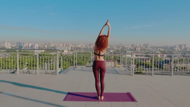 yoga-and-pilates-exercises-on-the-roof