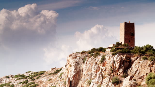 Stone-tower-house-on-Mani,-Greece.-Time-lapse