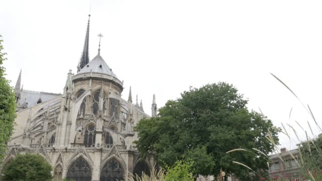 Notre-Dame-Cathedral-located-in-French-capital-Paris-slow-tilt