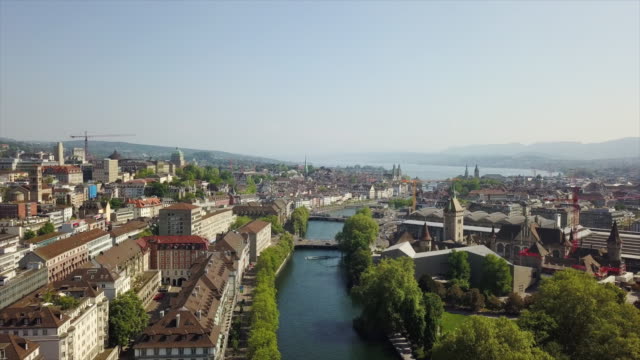 día-soleado-zurich-ciudad-centro-lago-vista-aérea-Suiza-panorama-4k