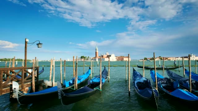 Gondolas-in-lagoon-of-Venice,-Italy