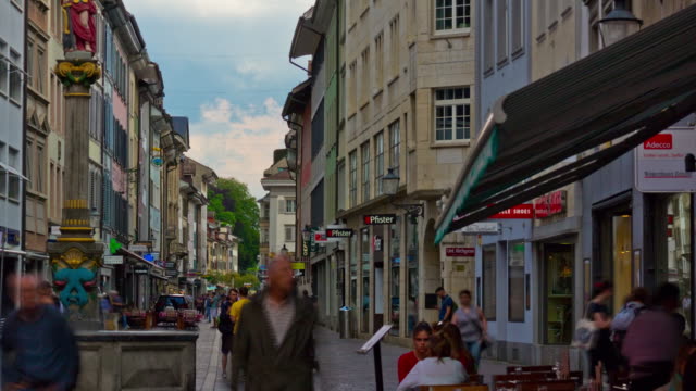 switzerland-day-light-geneva-city-crowded-pedestrian-street-panorama-4k-timelapse