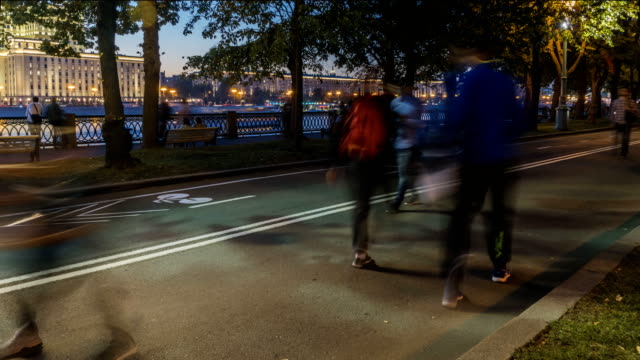 hyper-lapse-video-of-people-strolling-on-a-summer-day-along-the-Boulevard,-time-lapse