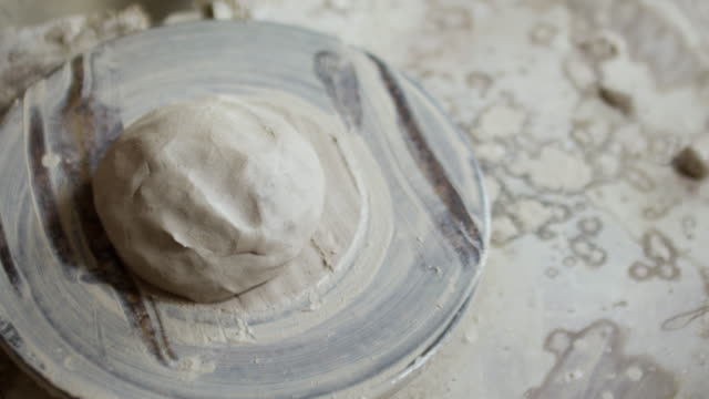 Hands-of-Potter-Working-with-Clay