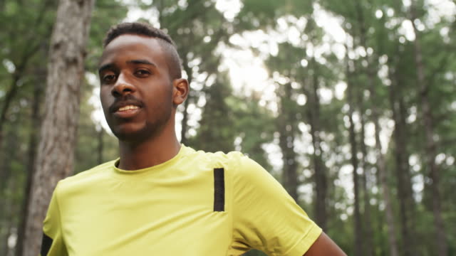 Confident-Black-Man-Posing-in-Forest