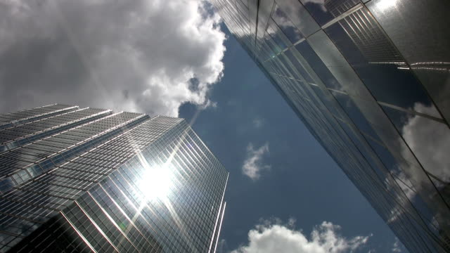 Office-towers.-Sun-and-cloud-reflections.