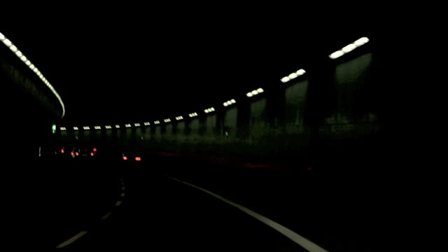 Driving-through-a-tunnel-at-night