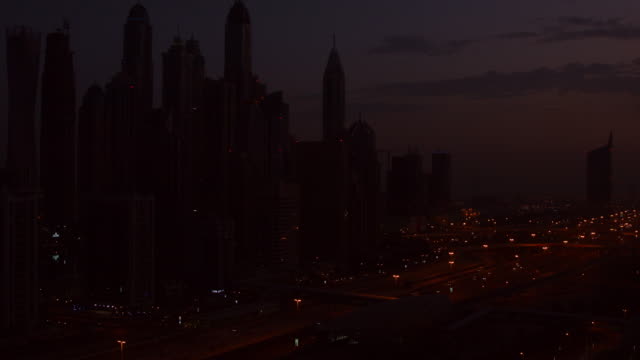 Time-lapse-shot-of-Sunrise-in-a-city,-Dubai,-United-Arab-Emirates