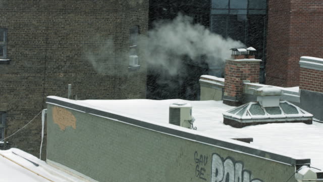 chimney-blowing-smoke-in-the-winter