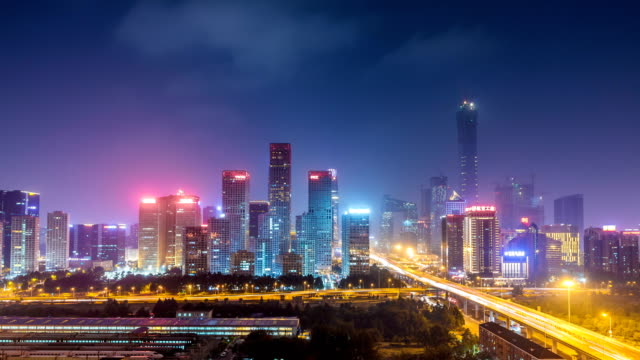 Lapso-de-tiempo-de-Jianwai-SOHO,-el-horizonte-de-la-CDB-en-la-noche-en-Beijing,-China