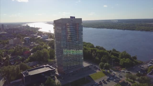 Aerial-view-of-River-and-modern-building.-Clip.-Beautiful-cityscape-at-the-sunset