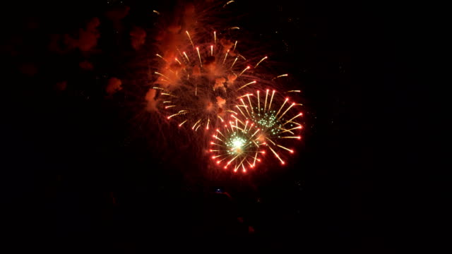 Festive-colorful-fireworks-on-dark-background