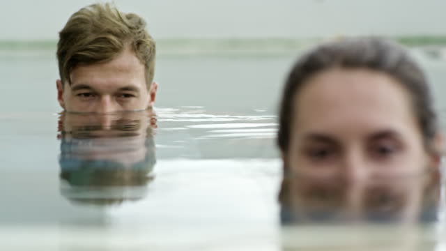 Loving-Man-and-Woman-in-Swimming-Pool