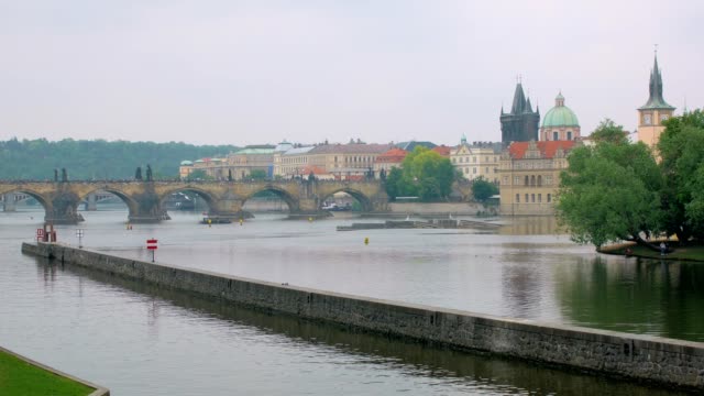 wonderful-calm-cityscape-in-Prague,-view-on-Vltava-river,-old-famous-Charles-bridge