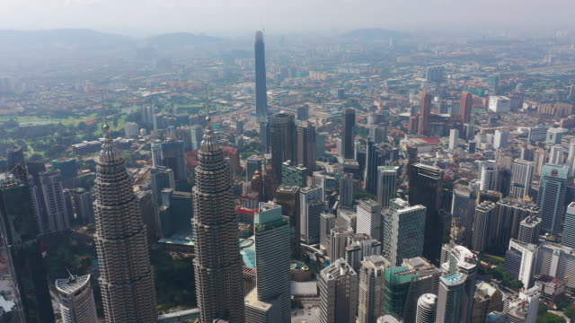 soleado-día-Kuala-Lumpur-ciudad-centro-panorama-aéreo-4k-Malasia