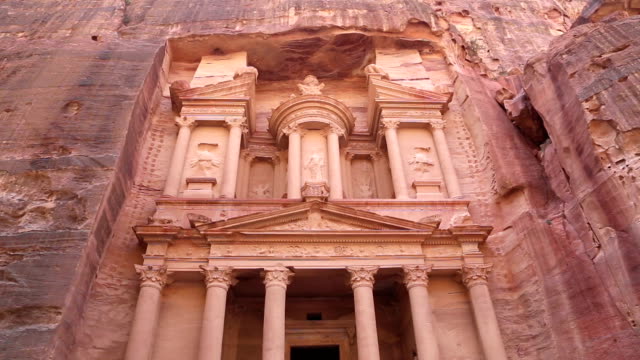 Al-Khazneh or The-Treasury at-Petra,-Jordan---it-is-a-symbol-of-Jordan,-as-well-as-Jordan's-most-visited-tourist-attraction.-Petra-has-been-a-UNESCO-World-Heritage-Site-since-1985