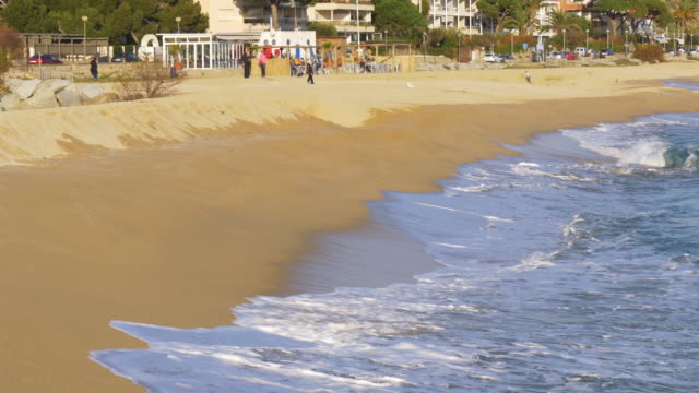 sunny-waves-caldes-d'estrac-beach-4k