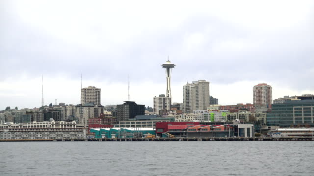 Stabilized-Panning-Shot-of-Seattle-Waterfront-Downtown-By-Boat