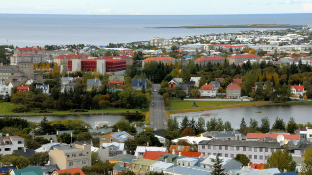 top-panorama-of-Reykjavik-city-with-lake-Tjornin-in-autumn-time,-calm-cityscape