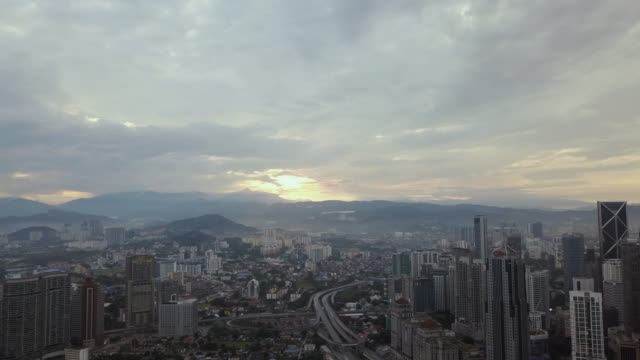 Aerial-Footage---Petronas-Towers-at-Sunrise.-Flat-Color-Profile.