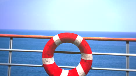 Red-lifebuoy-on-passenger-ship-in-ocean
