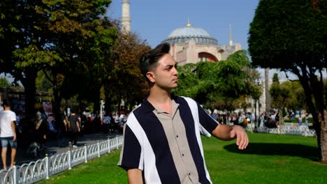 Hagia-Sophia-Istanbul-young-man-looking-around-front-Hagia-Sophia