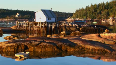 A-small-lobster-village-building-in-Stonington-Maine-is-on-a-rock-island-and-pier
