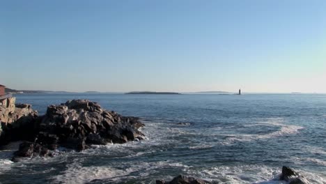 The-Portland-Head-Lighthouse-oversees-the-ocean-from-rocks-in-Maine-New-England--2