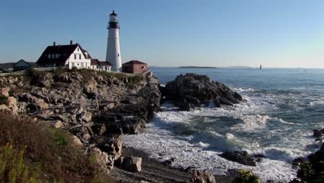 The-Portland-Head-Lighthouse-oversees-the-ocean-from-rocks-in-Maine-New-England--6