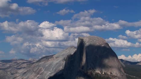 A-time-lapse-of-white-clouds-over-a-blue-sky-and-rocky-mountain-range-in-Yosemite-National-Park-California-1