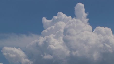 A-time-lapse-of-thunderclouds-expanding-in-a-blue-sky-1