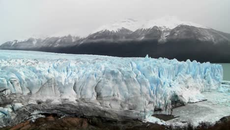 Pan-across-a-vast-glacier-where-it-meets-the-sea-1