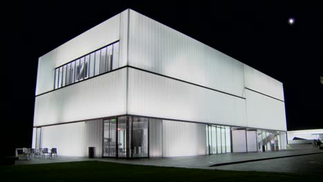 A-modern-building-is-illuminated-and-glows-from-the-inside-3