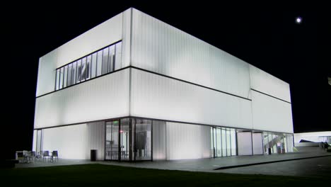 A-modern-building-is-illuminated-and-glows-from-the-inside-4