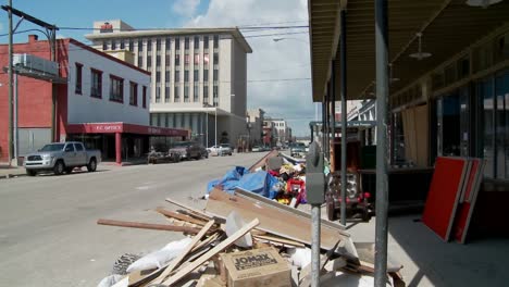 Junk-and-refuse-sits-on-the-street-during-the-cleanup-after-Hurricane-Ike-in-Galveston-Texas