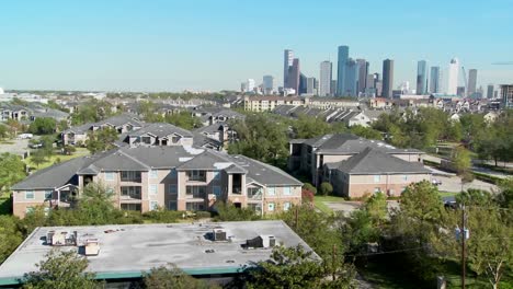 A-pan-across-a-suburban-area-of-Houston-with-the-downtown-distant