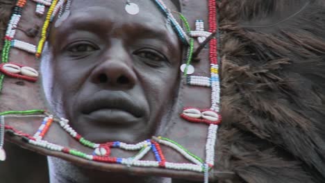 An-extreme-close-up-of-a-face-of-a-Masai-warrior-with-full-headdress