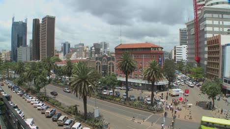 Wide-shot-of-downtown-Nairobi-Kenya-with-traffic-and-pedestrians-1