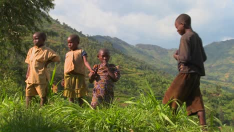Rwanda-children-stand-in-farm-fields