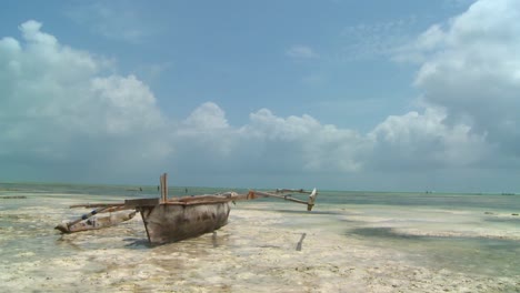 A-romantic-tropical-island-paradise-shot-with-an-outrigger-canoe-on-the-beach