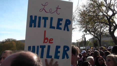 A-sign-at-a-political-rally-says-Let-Hitler-Be-Hitler