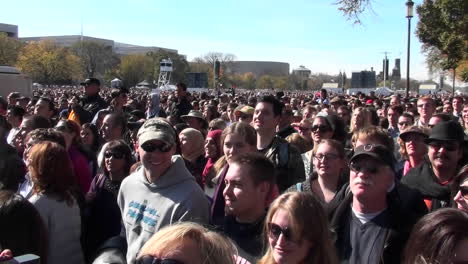 Crowds-of-protestors-on-the-mall-in-Washington-DC-jump-up-and-down-in-unison