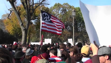 A-peace-flag-flies-at-a-political-rally-in-Washington-DC-1