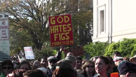 A-sign-is-carried-at-a-rally-stating-that-God-hates-figs