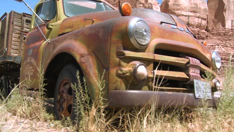 A-tracking-shot-of-an-old-rusting-pickup-truck