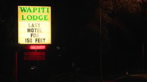 A-road-side-motel-advertises-last-motel-for-150-feet