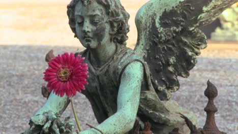 An-angel-sculpture-in-a-cemetery-on-a-grave-1