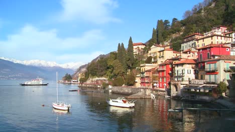 The-beautiful-shores-of-Lake-Como-with-the-town-of-Varenna-and-the-Italian-Alps-in-background