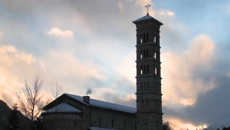 Time-lapse-clouds-passing-behind-a-church-steeple