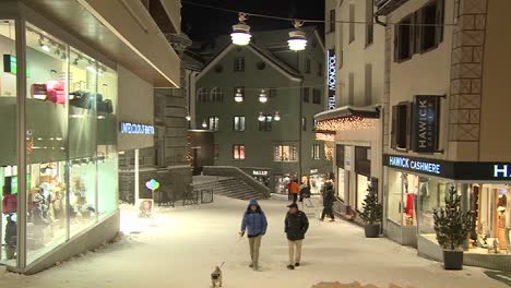 Pedestrians-walking-on-the-clean-modern-streets-of-St-Moritz-Switzerland-in-winter-1